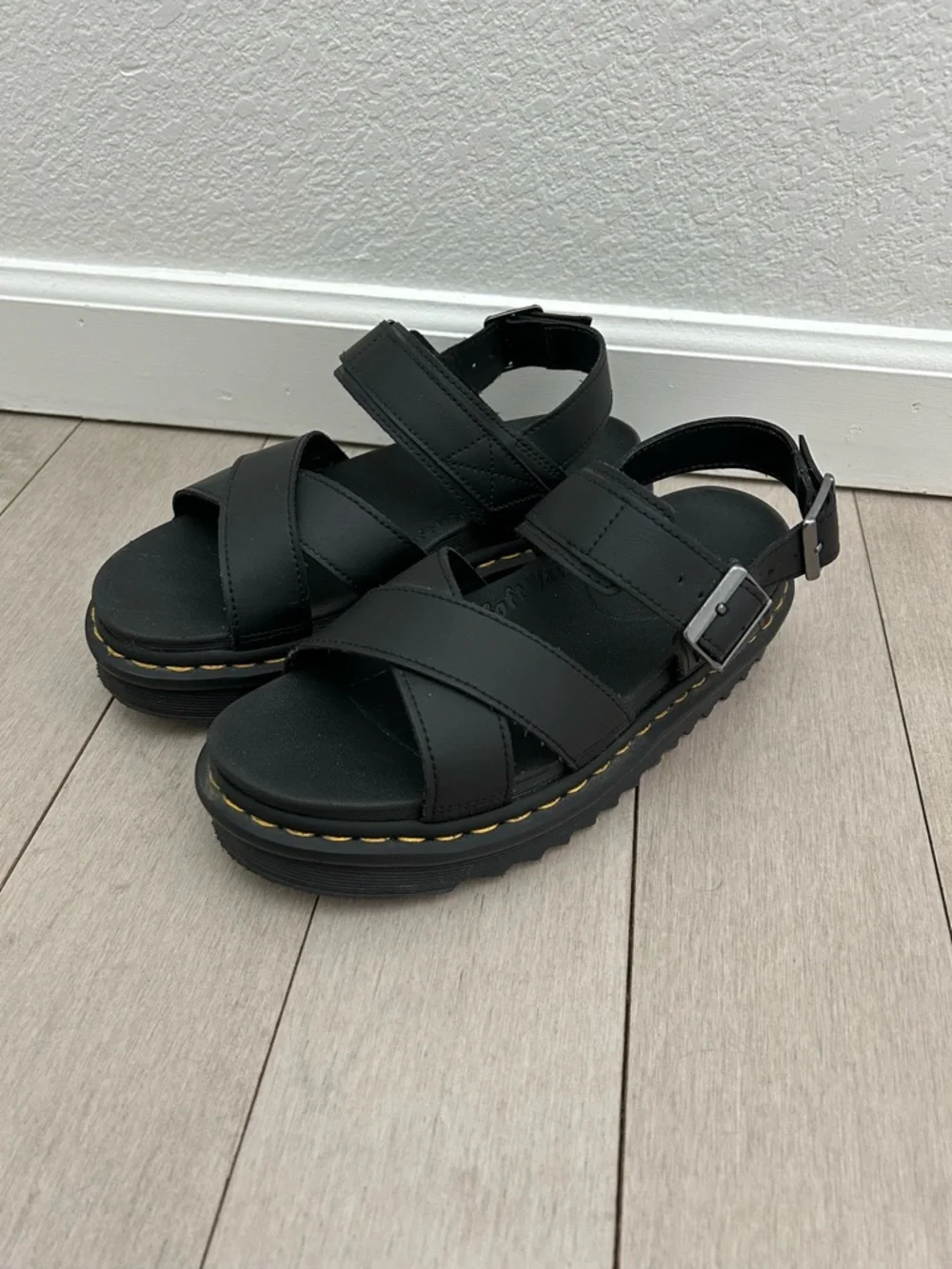 Dr. Martens Black Platform Crisscross Sandals with Yellow Stitching